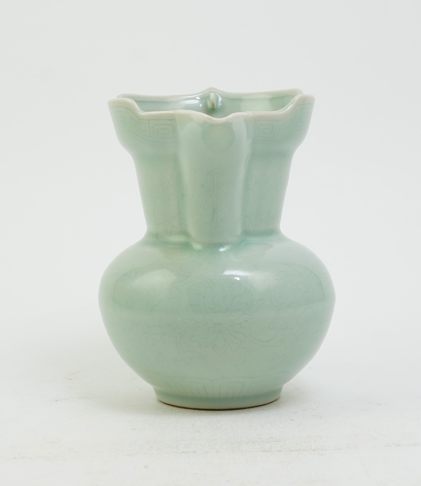 A Chinese incised celadon glazed monks cap ewer, Qianlong seal mark but later, 17cm